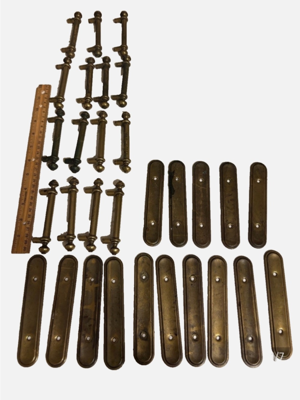 Lot of 15 vintage preowned cabinet handles with backplates. 2 sets available.